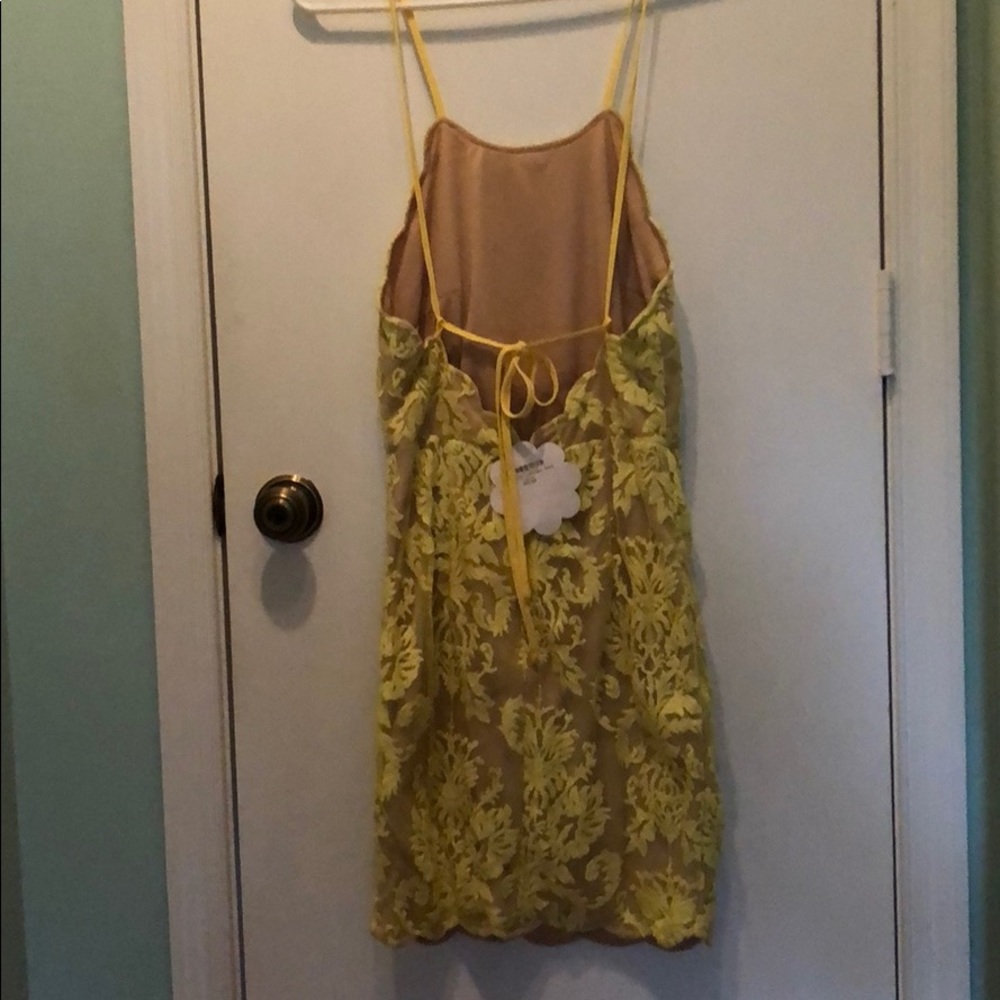 Yellow lace, open back dress